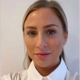 woman with hair tied back